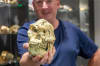Dr Jess Martin and a three-dimensional replica of Little Foot's skull.