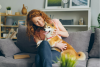 Dog owner hugging dog

Stock image