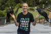 ILF Lifetime Ambassador Andy Griffiths soars into the launch of 'The Great Book Swap' with Wattle  and Monotoco, native Red-tailed Black Cockatoos at Taronga Zoo. Credit: Joseph Mayers. 