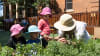 Children play with an early learning educator at Uniting Airlie Preschool, Oatlands