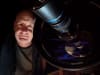 Jonathan Bradshow with his telescope. 
