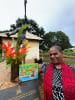 Author Mavis Kerinaiua at the Old Church precinct on Bathurst Island with the statue dedicated to Matthias Ullungura and Tiwi Islanders for their contribution to the defence of Northern Australia during World War II. Photo by Allen Murphy.