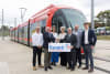 From left: Keith MacHale, CEO, Transit9; Meghan Oldfield, CEO, Canberra Metro Operations (CMET); H.E. Fiona Flood, Ambassador of Ireland to Australia; Minister Kevin "Boxer" Moran T.D.; CMET representatives; Niall Casey, Enterprise Ireland. 