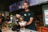 Zambrero Chief Product and Innovation Officer Richard Prout assembles a Nourish+ bowl