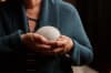 Woman holding human Reterniti stone