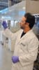 Dr Hamidreza Mahdavi holds the advanced membrane developed by Monash researchers, designed to selectively separate valuable materials and contaminants at the molecular level.