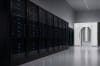IQM Radiance quantum computer (right) co-located with classical HPC infrastructure (left) in a data center environment.