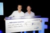 Mark Hughes being presented last year with a cheque for $120,000 by GRNSW CEO Steve Griifin.  