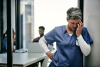 Spinal Health Month - Back Pain and Mental load - healthcare worker
