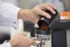 Coffee grounds being added to the portafilter, which features an ultrasonic horn to create a phenomenon called acoustic cavitation that accelerates the brewing process using only cold water. Photo by Richard Freeman/UNSW