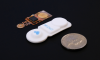 The AusculPatch is a tiny wearable sensor that weighs just 3.2 grams. Image from UNSW