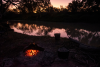 Sunset campfire by Cooper Creek in Innamincka.