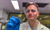 Dr Brendan Dyett with an experimental microneedle patch sample. Image: Cherry Cai, RMIT University  