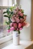 Flowers by the window