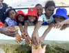 Groote children with seaweed