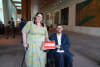 People with Disability Australia Acting CEO Megan Spindler-Smith hands over PWDA's petition regarding the NDIS cuts to Senator Jordon Steele-John