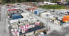 Aerial view of civil construction and infrastructure equipment from the Gold Coast Light Rail Stage 3 project being prepared for auction.
