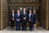 TLC Healthcare CEO & MD with Mayo Global Team officials in front of the Iconic Plummer Door Entry at Mayo Clinic Centre, Rochester Minnesota USA. Names and titles of the individuals in the photo:- * Mr Lou Pascuzzi, CEO&MD TLC Healthcare * James Hebl, M.D., Anesthesiologist, Senior Advisor, International * Terry Brandt, Senior Advisor, International (Emeritus) * April Bursiek, M.S.N., R.N., A.C.N.S.-B.C. Senior Advisor, International Nursing * Eric Short, PMP, Program Manager, International Facilities *