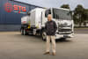 Image caption: STG Global CEO James Agius with a Hino 700 Series 