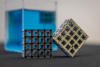 Cross sections of the titanium lattice cube showing before and after being filled with polyurethane foam for buoyancy. Credit: Sara Tan, RMIT. 
