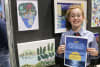 Ginger Jones pictured alongside her artwork