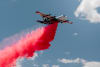 A Coulson Aviation C-130 airtanker conducts an aerial drop of CFR HALO, a next-generation fire retardant developed through Coulson Fire Retardant and EmberWorks.