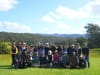 "Field-based learning creates opportunities for students to engage directly with complex real-world situations, apply their judgement and reflect on their own lived experiences," says Dr Leimbach. Students pose with Aboriginal Elder Bruce (centre).
