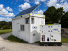 United Rentals 20ft Solar Platform and Hybrid Power Unit, with a a Site Office. 