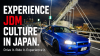 JDM TOUR promotional artwork featuring a blue sports car and the message "Experience JDM culture in Japan."