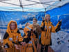 Snow falls in a mobile Antarctic classroom