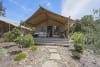 Exterior of one of the glamping safari tents at Reflections Lennox Head 