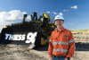 Thiess2.jpg: Thiess Project Manager Jeremy Taylor proudly stands alongside the 6,000th D11 dozer at Thiess' Lake Vermont mining operations