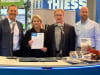 Thiess 4.jpeg: Thiess Group Executive Chair and CEO Michael Wright, FLANDERS Chief Executive Officer Kim Weninger, FLANDERS Chief Commercial Officer Wayne Chmiel, and Thiess Group Executive - Americas Darrell White, celabrating