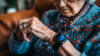 Older woman wearing smartwatch. Credit: AdobeStock