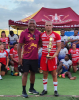  Queensland State of Origin and Australian international representative prop forward Petero Civoniceva joins year 12 PBC student Riley Buchanan at the presentation of the PBC SHS Fiji tour Cup during the trip.