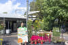 STEPS Garden Centre Manager April Heard holding sign promoting Harvest Day Autumn 2025
