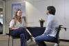 A Lifeline Connect Supporter (left) talks with a drop-in client at Hornsby. 
Photo supplied by Lifeline Harbour to Hawkesbury Sydney.