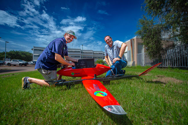 NACAS flight team (Professor Hamish Campbell, Matthew Worrad) with one of the Bibi planes. Credit: CDU media