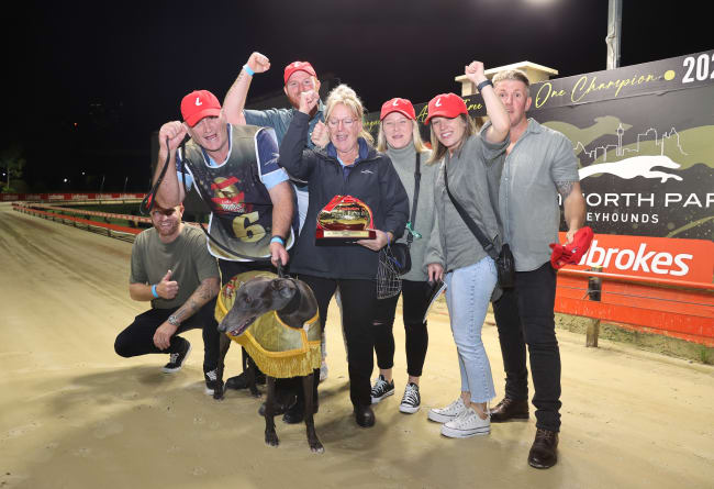 Connections celebrate the win of Power And Glory in the Ladbrokes Golden Easter Egg at Sydney's Wentworth Park on Saturday night.  