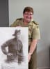 Wendy Farnham with a photo of her grandfather, James Bruce Lithgow