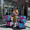 Jimmy Vernon delivers the 20,000th Care Pack to kids with cancer