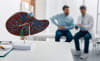 Conceptual image of a patient during a hepatologist consultation.