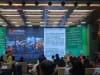 Texts from simultaneous interpretation generated by a large language model for AI interpretation of a Guangxi based technology company are displayed during an international conference in Nanning, May 13, 2025.
