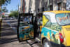 The custom-wrapped cab that brought a roving album experience to the streets of Sydney.