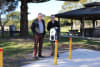 L-R, Dr Michael Holland, MP for Bega, with Cameron Tynan, Executive Manager (Property Development and Planning) at Reflections Holidays, with the EV Charging Station at Reflections Eden