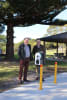 L-R, Dr Michael Holland, MP for Bega, with Cameron Tynan, Executive Manager (Property Development and Planning) at Reflections Holidays, with the EV Charging Station at Reflections Eden