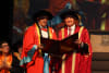 Uncle Paul Briggs AO with La Trobe University Chancellor John Brumby AO. 