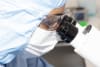 A scientist at Magellan Stem Cells examines cells.