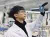 UNSW Scientist Xiaojun Ren holding the graphene oxide aerogel