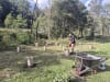 LAPP Australia Managing Director Simon Pullinger tends to 250 newly planted saplings at his bushland home, protected from the interest of hungry local fauna by recycled cable spool "collars".